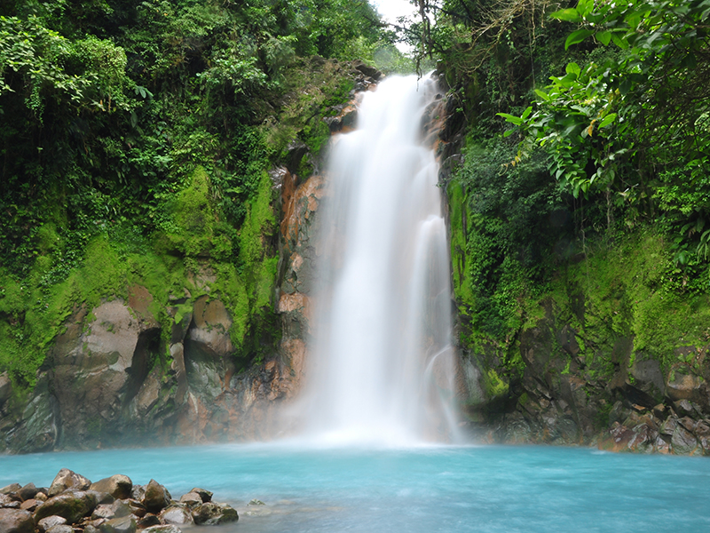 Celestial blue waterfall in Costa Rica